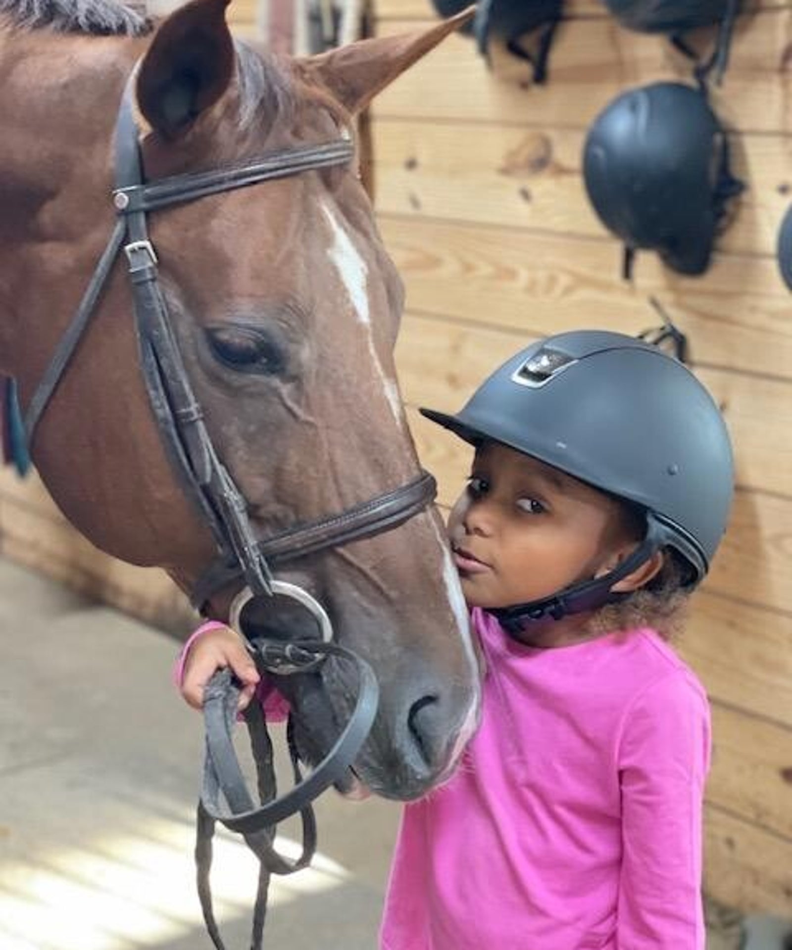 Five Star student riding during a lesson